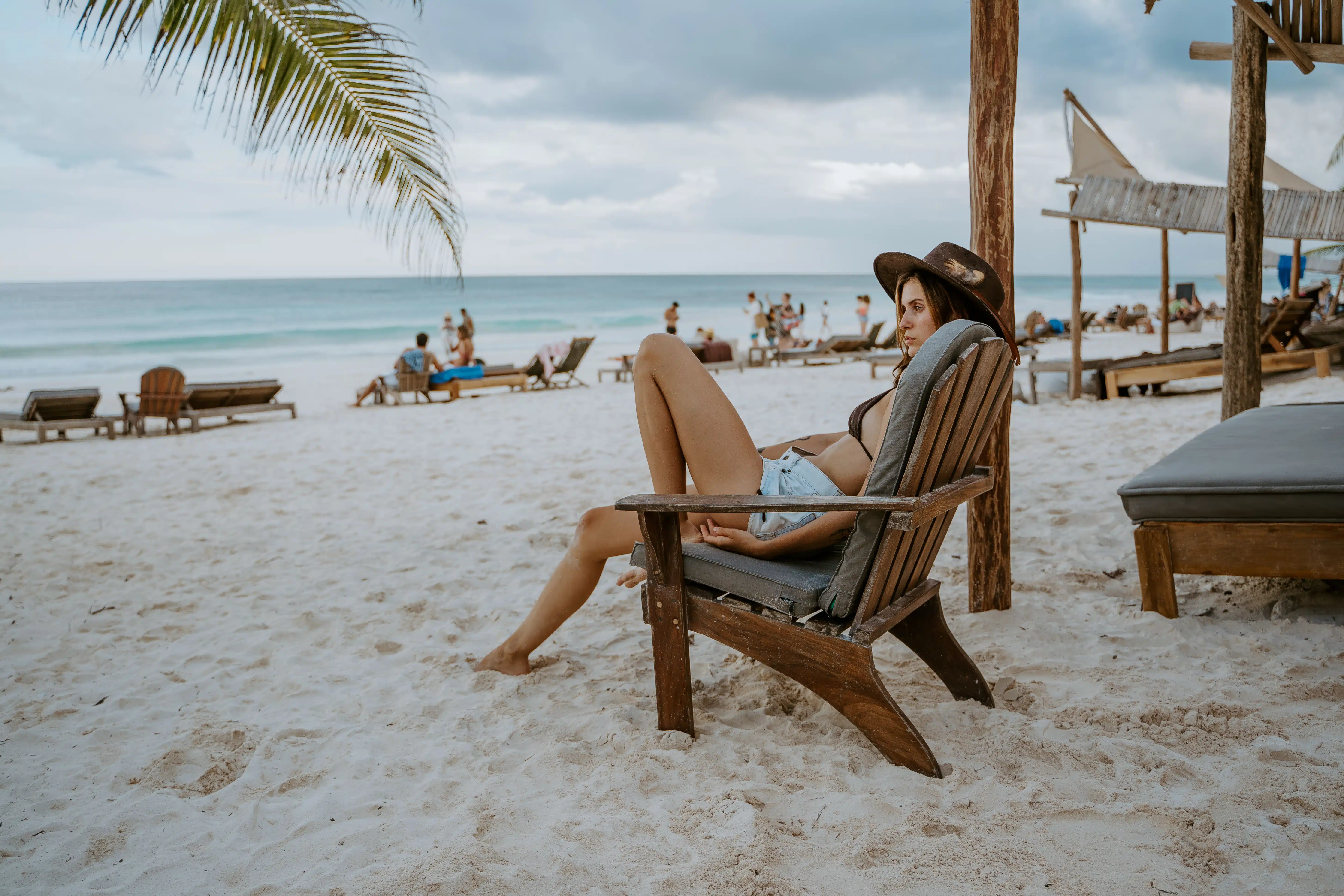 Ahau Beach Grill — beachfront table setting with the Caribbean beyond