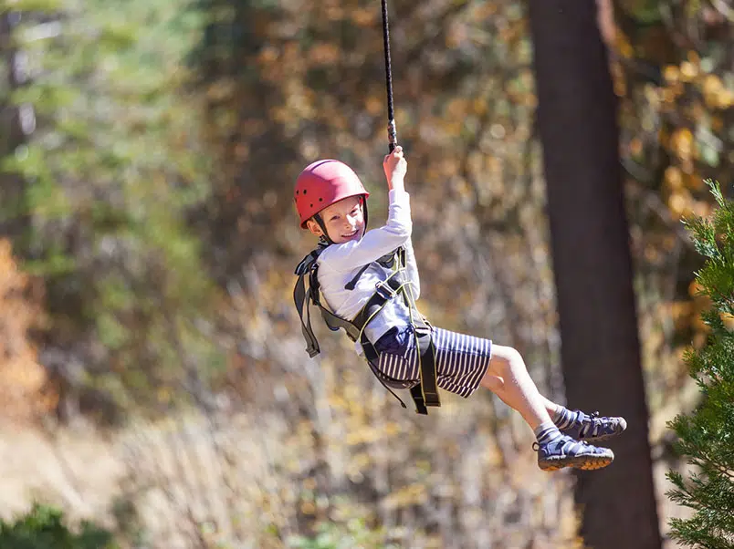 Zip-lining through the jungle at Xplor